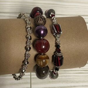 Set of three bracelets, red, pink, purple silver